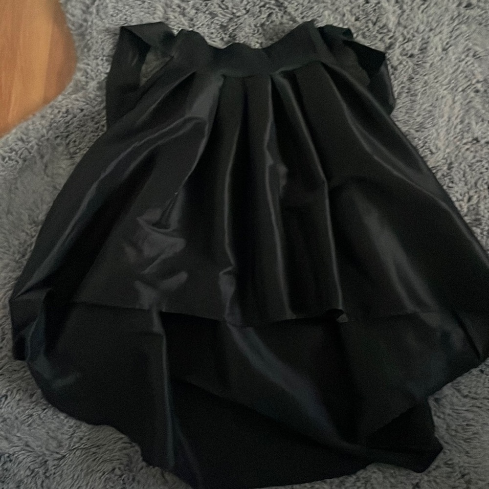 Black short in front long in back skirt